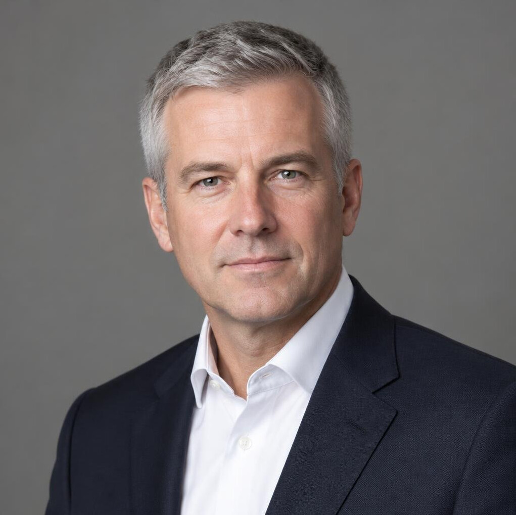 Portrait of a man in a suit with a calm expression