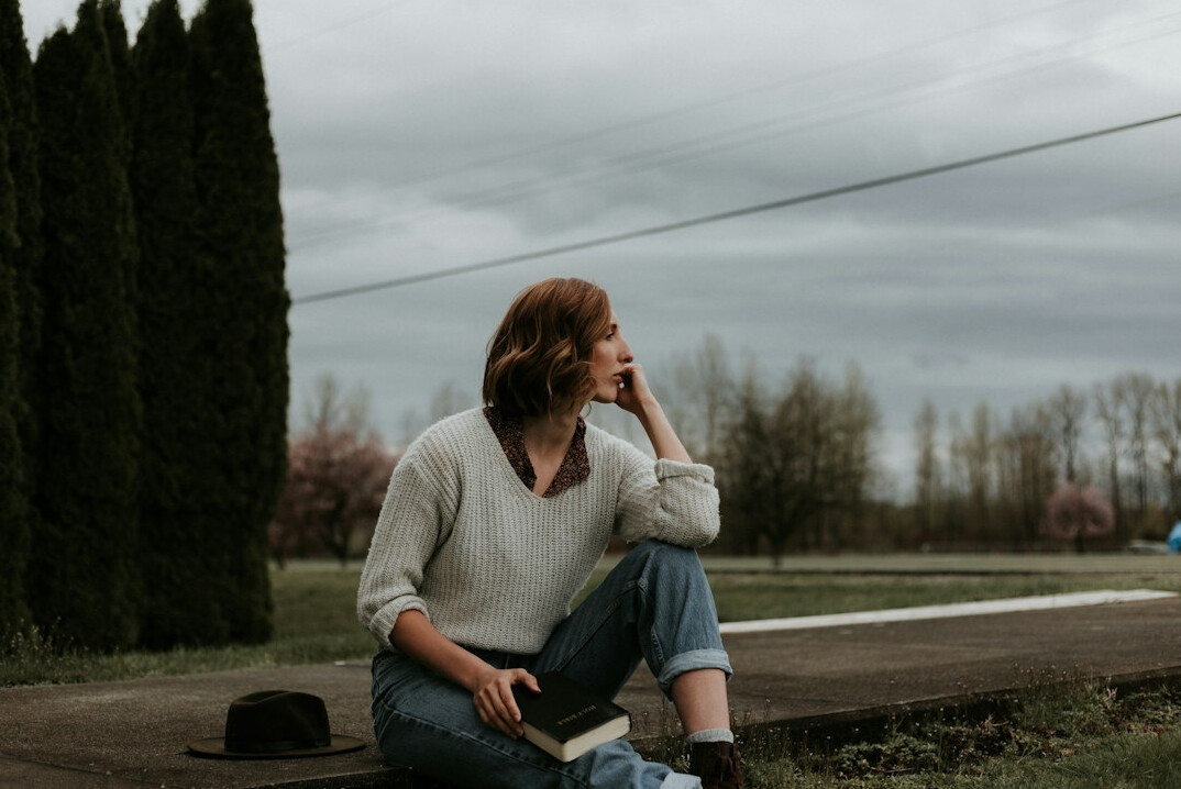 person thinking deeply