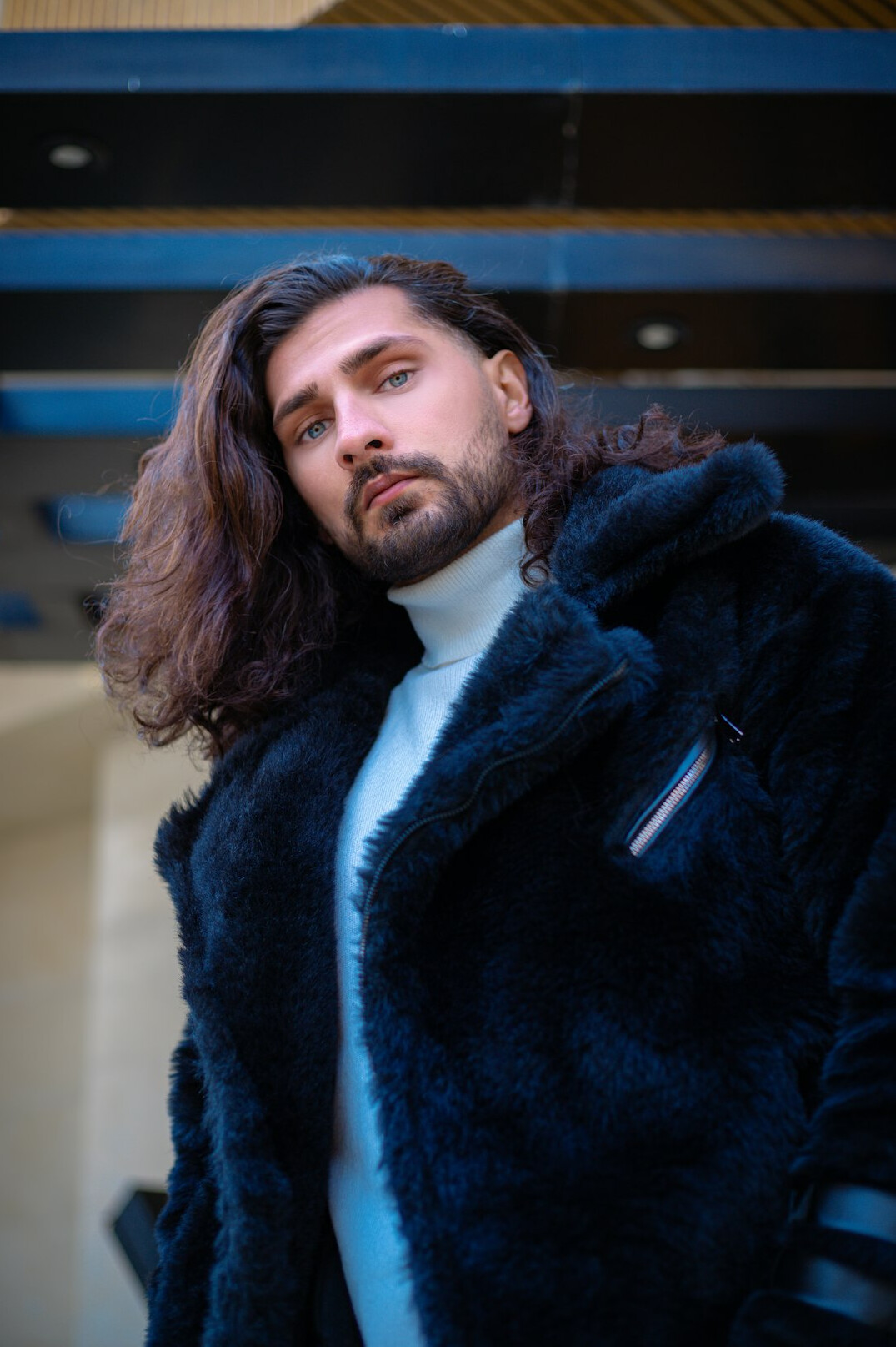 Portrait of a bearded man in a dark jacket