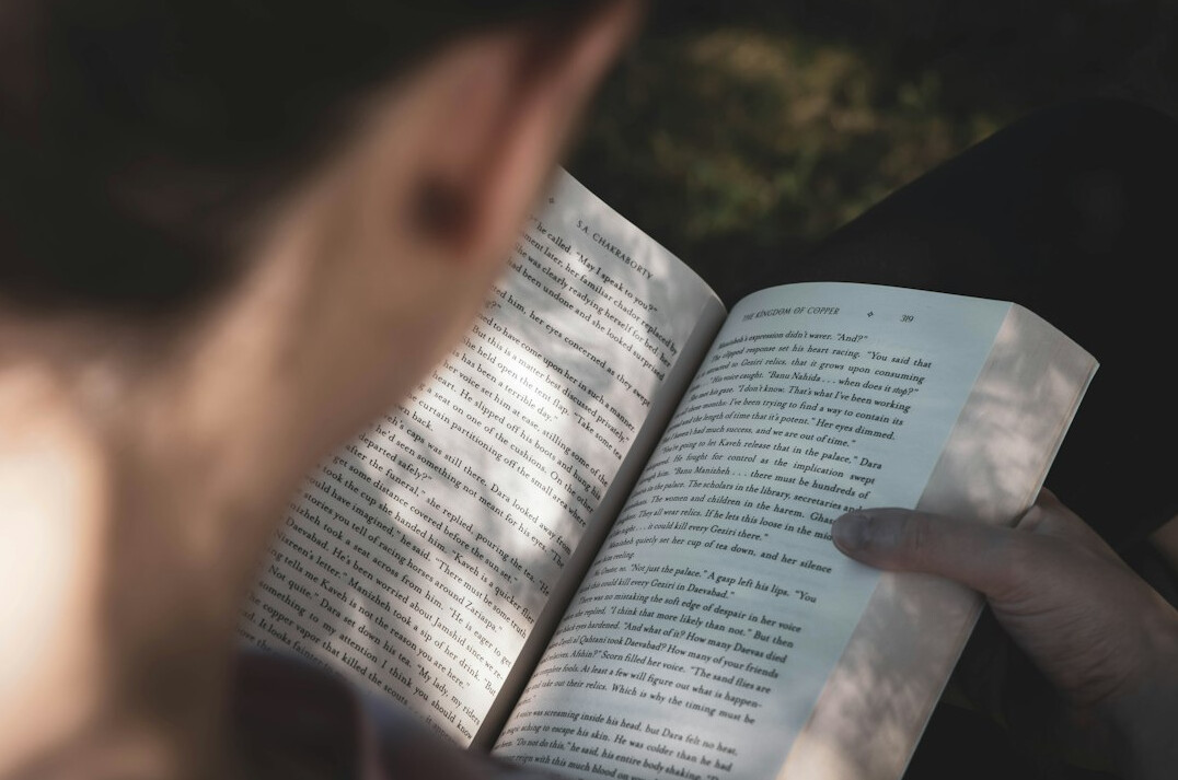 person reading german book